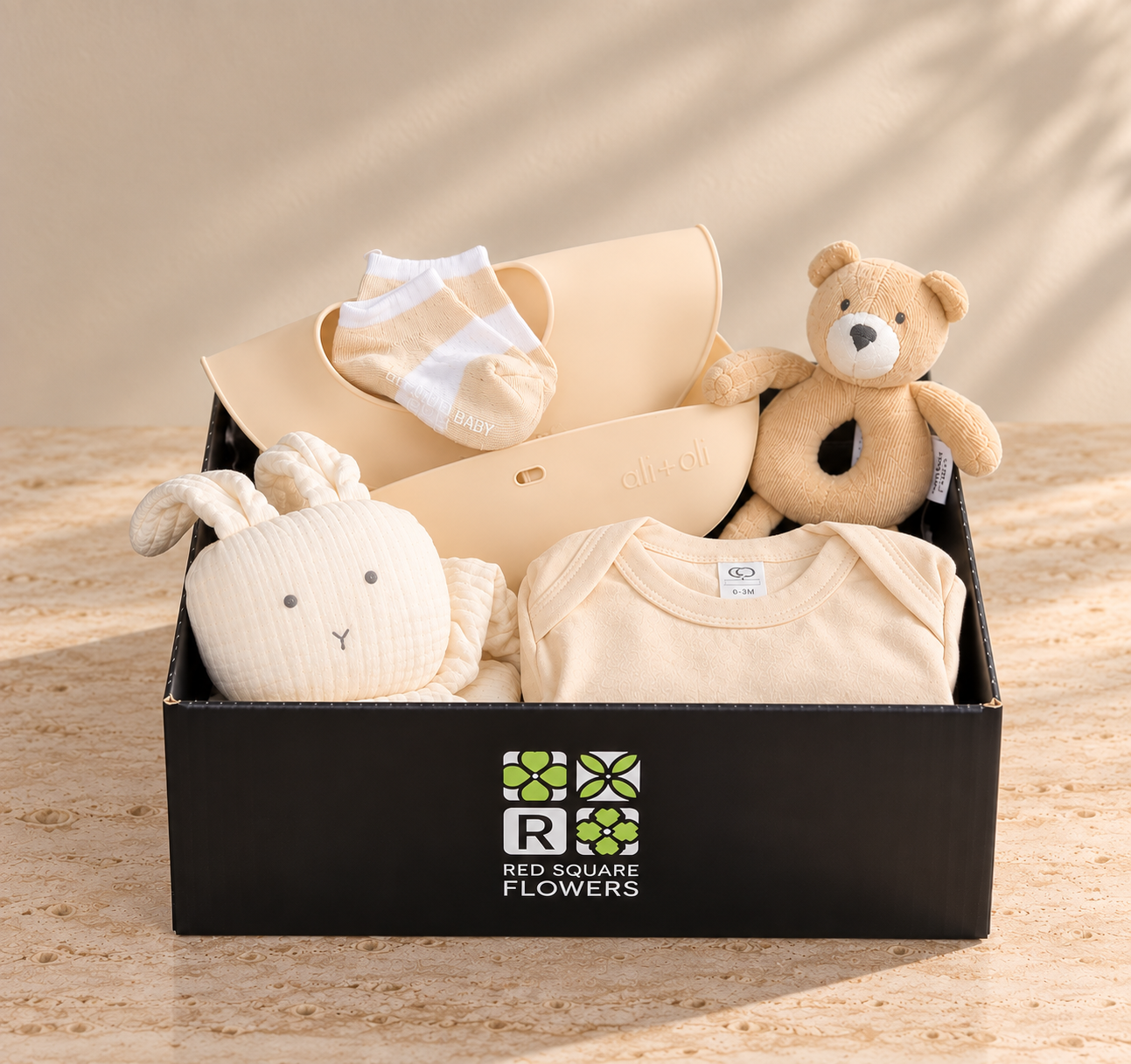 Little Beginnings neutral Baby Gift Crate with organic baby essentials